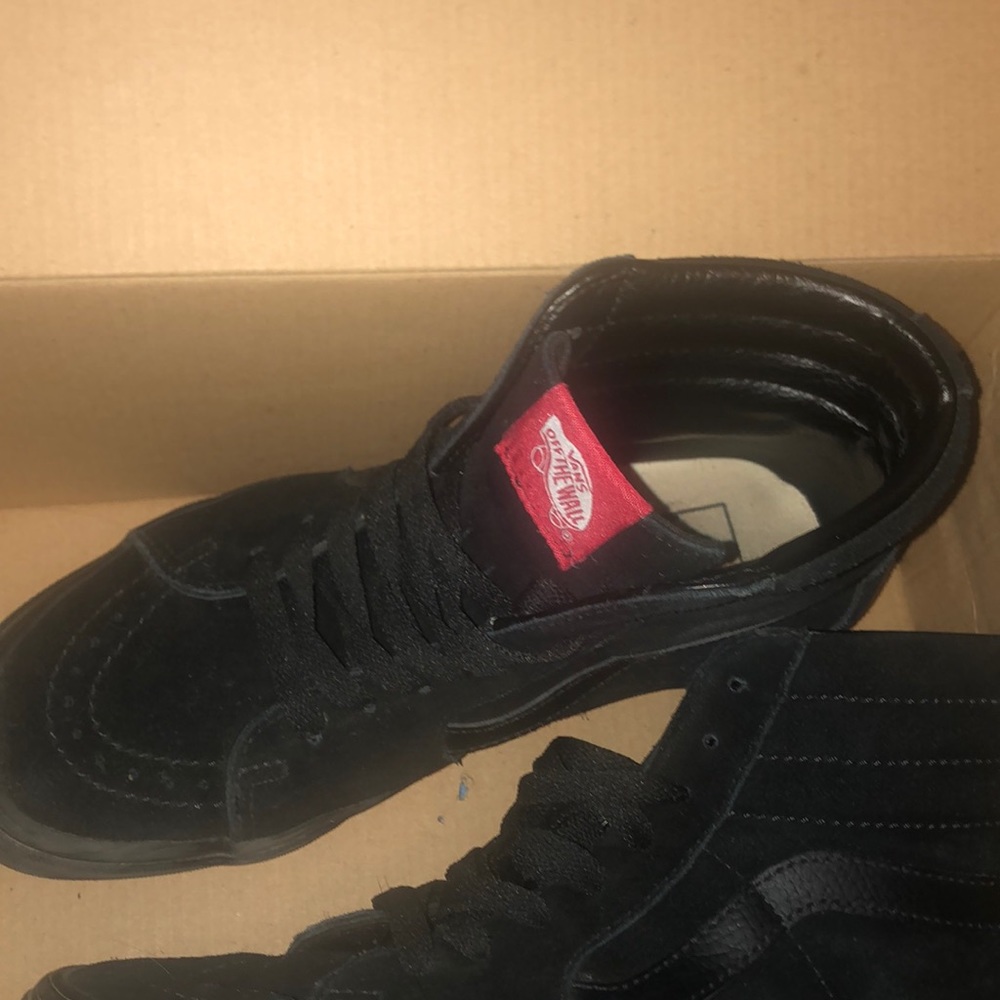 Black vans (high cut)